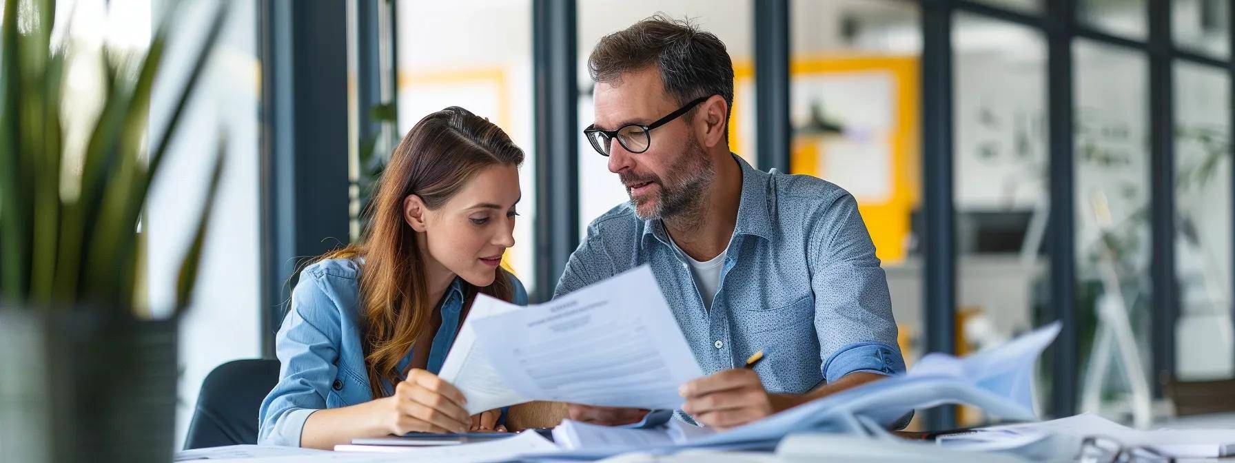 a confident homeowner in a modern office setting reviews detailed roofing contract documents alongside a seasoned roof contractor, with a focus on the warranty information displayed prominently on the table, conveying a sense of informed decision-making and professionalism.