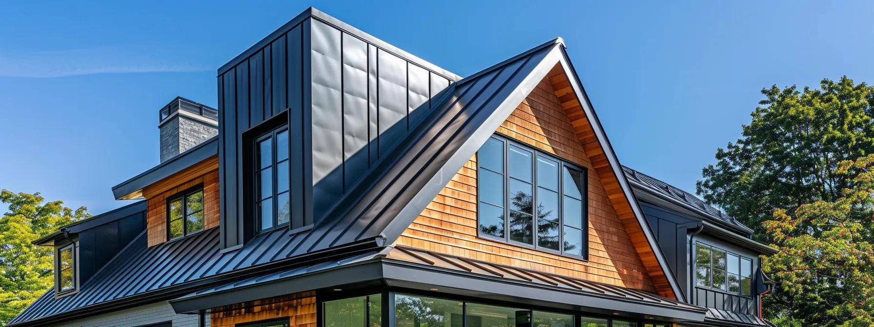 a modern massachusetts home with a striking contrast between sleek metal shingles on one side and classic asphalt shingles on the other, set against a clear blue sky, highlighting the choices homeowners face in roofing materials.